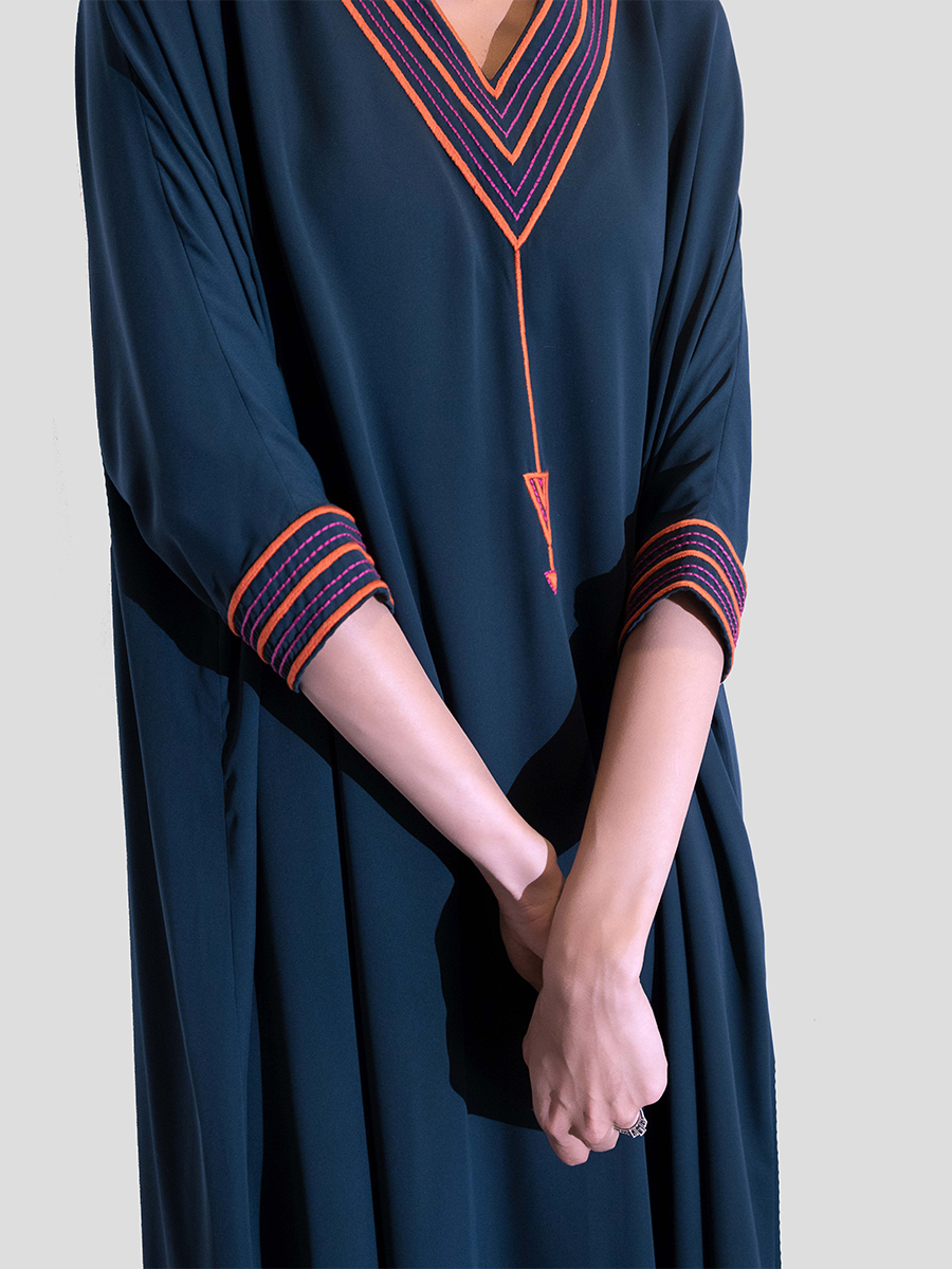 Navy dress with embroidery on neck and sleeves