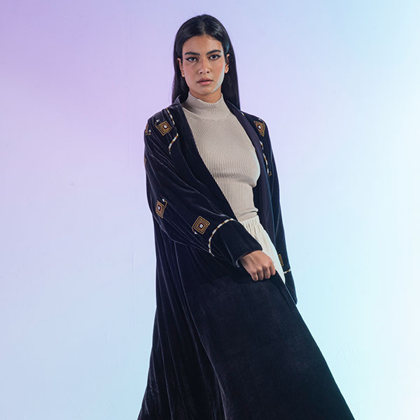 Abaya made of velvet material decorated with hand embroidery, inspired by the Hijaz region