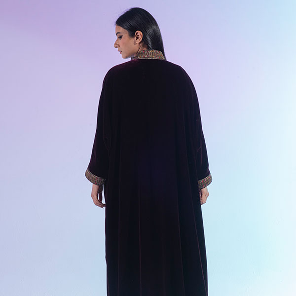 A velvet dress with hand embroidery inspired by the heritage of the Najd region