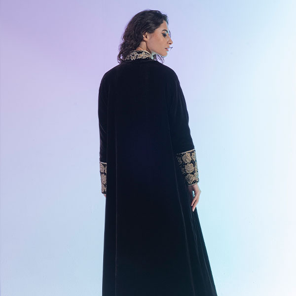 An abaya made of velvet material decorated with hand embroidery, inspired from Hijaz region