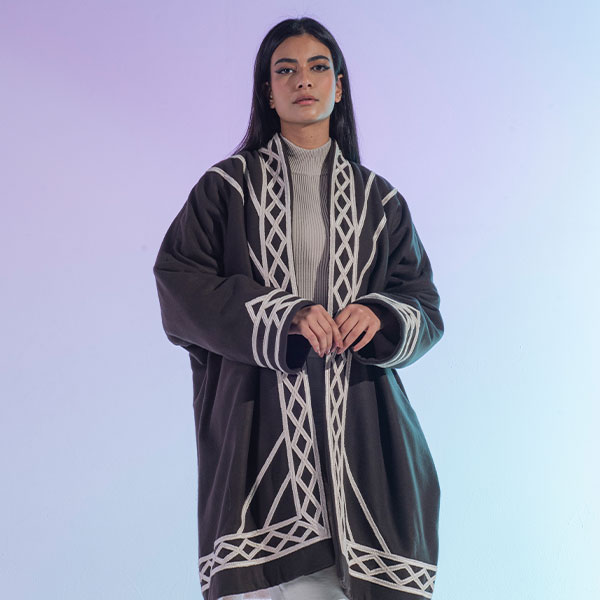 A traditional wool jacket with hand embroided that reflects the heritage of the Najd region