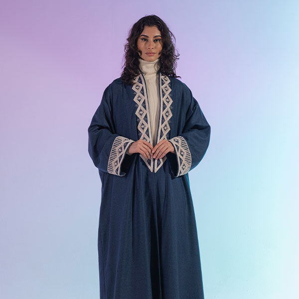 Hand-embroidered woolen womens bisht reflects the heritage of the Hijaz region