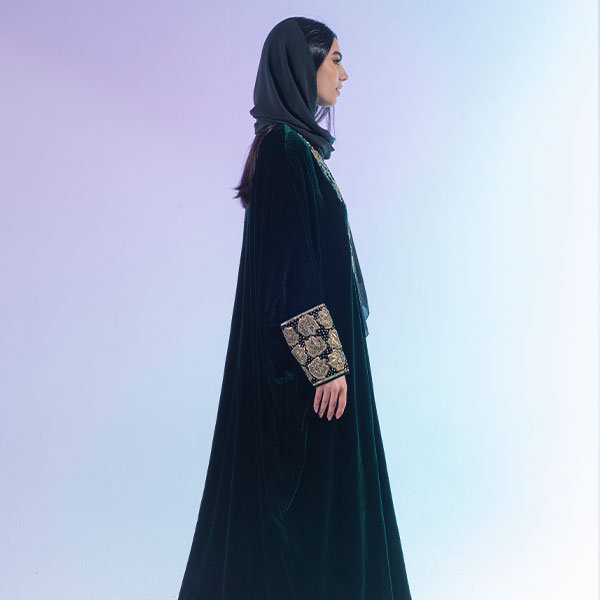 Abaya made of velvet material decorated with hand embroidery, inspired by the Hijaz region