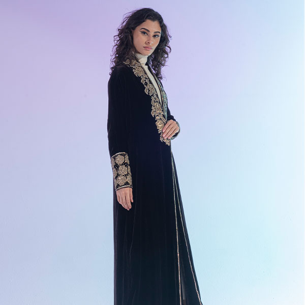 An abaya made of velvet material decorated with hand embroidery, inspired from Hijaz region