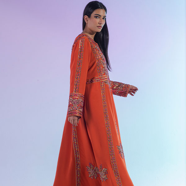 A dress made of crepe with hand embroidery, inspired by the heritage of the Hijaz