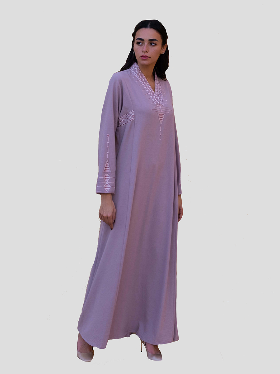 lavander dress with embroidery on neck and sleeves