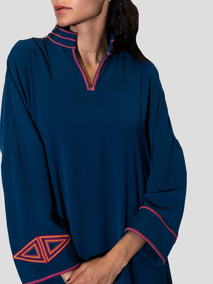 Blue dress with embroidery on the neck