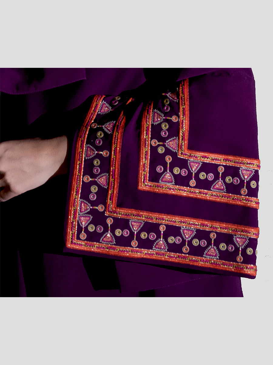 Purple wide-sleeved dress in crepe fabric with hand-embroidered bidi-inspired motifs