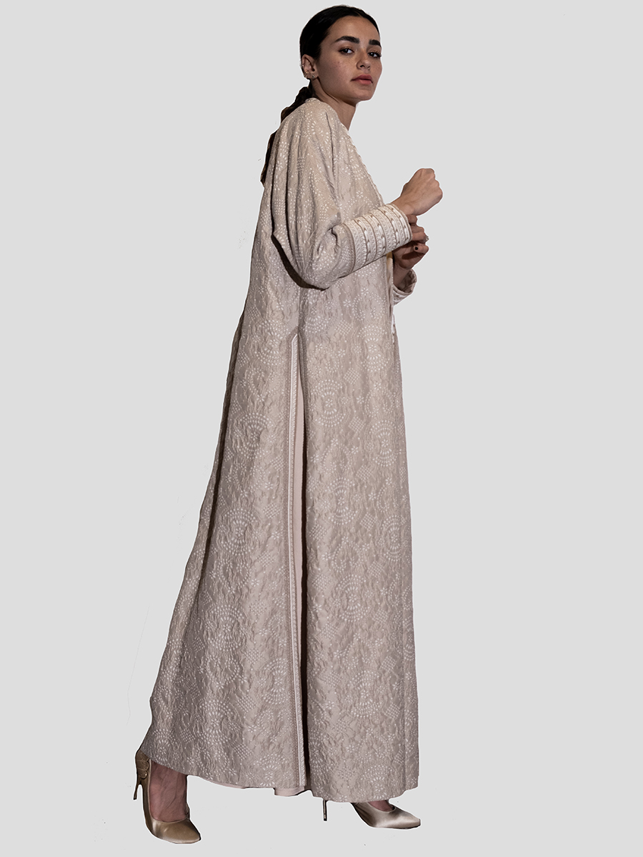 Abaya with inner dress The decorations are inspired by the Najd region