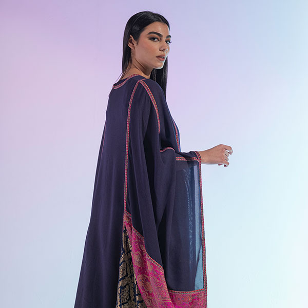 A traditional Najdi dress made of bisht material, hand embroidered