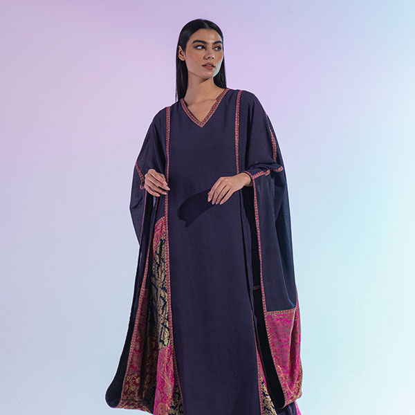 A traditional Najdi dress made of bisht material, hand embroidered