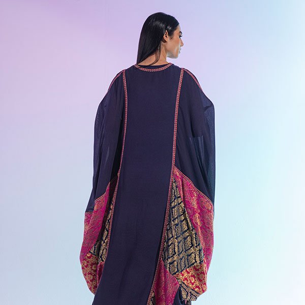 A traditional Najdi dress made of bisht material, hand embroidered