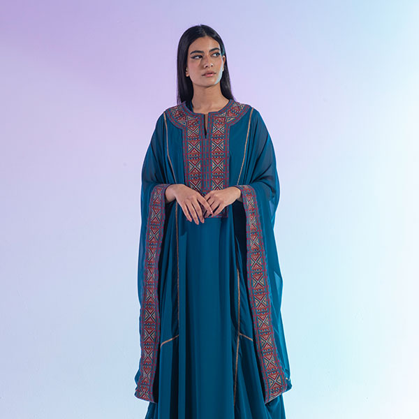 A traditional Najdi dress made of bisht material, hand embroidered