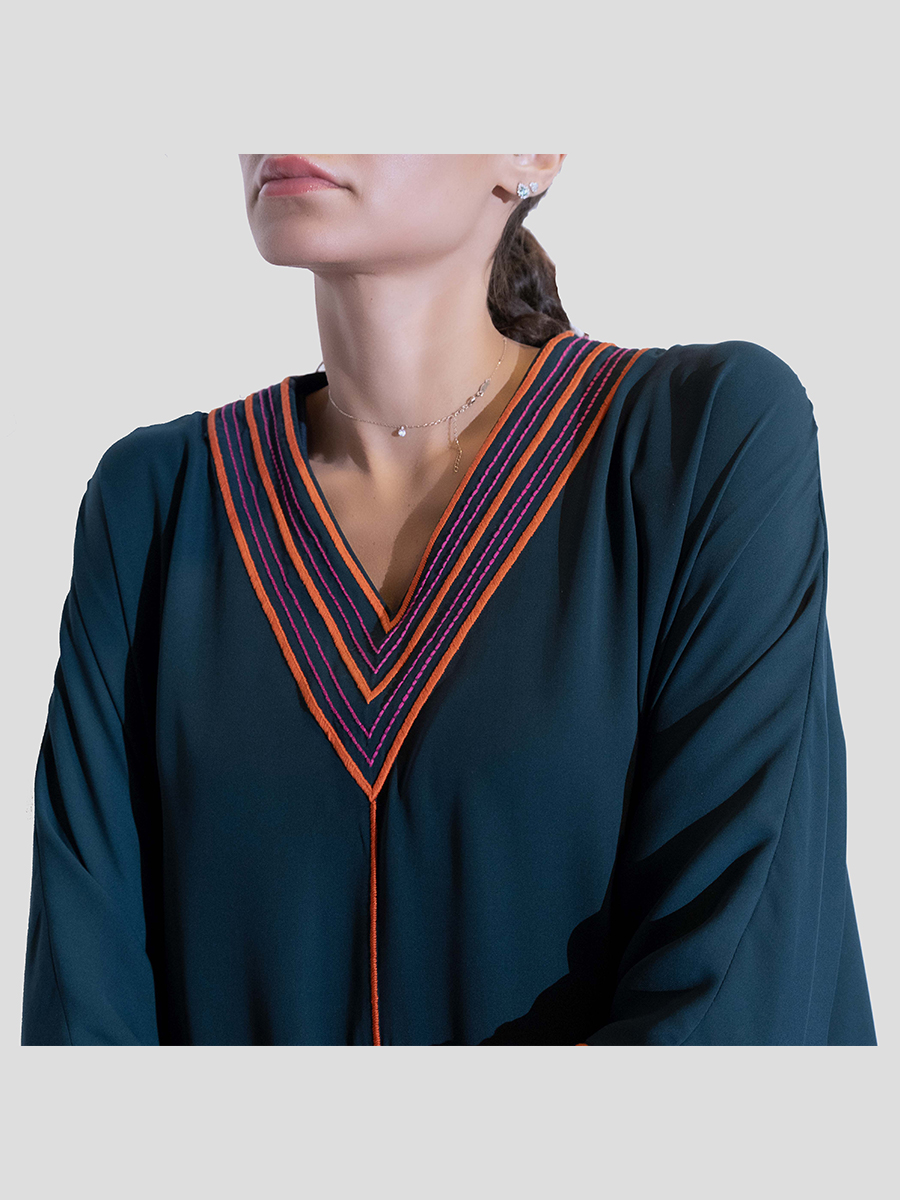 Navy dress with embroidery on neck and sleeves