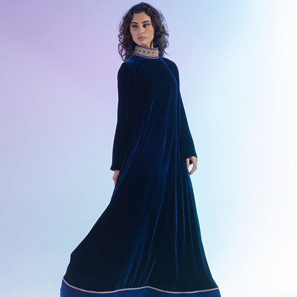 A velvet dress with hand embroidery inspired by the heritage of the Najd region