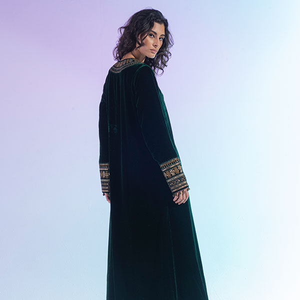 Velvet dress with hand embroidery inspired by the heritage of the Najd region