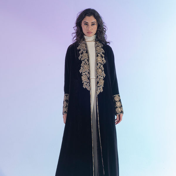 An abaya made of velvet material decorated with hand embroidery, inspired from Hijaz region