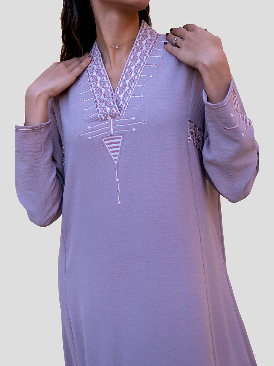 lavander dress with embroidery on neck and sleeves