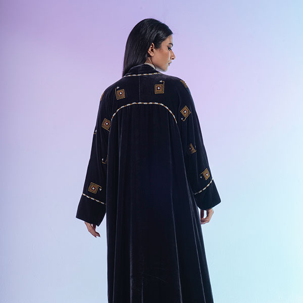 Abaya made of velvet material decorated with hand embroidery, inspired by the Hijaz region