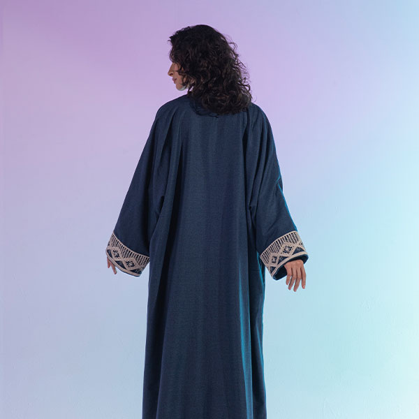 Hand-embroidered woolen womens bisht reflects the heritage of the Hijaz region