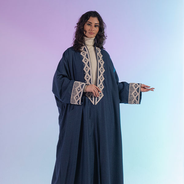 Hand-embroidered woolen womens bisht reflects the heritage of the Hijaz region