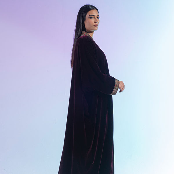 A velvet dress with hand embroidery inspired by the heritage of the Najd region